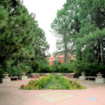 The Peace Garden at the Cheyenne Botanic Gardens, framed by trees.