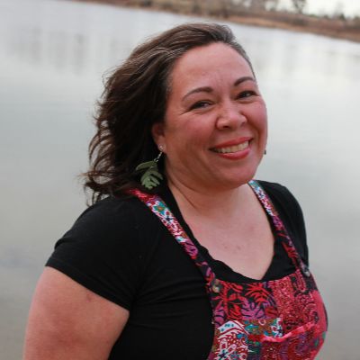 Picture of an employee near a lake